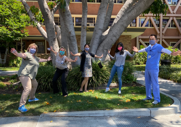healthcare workers showing six feet apart 